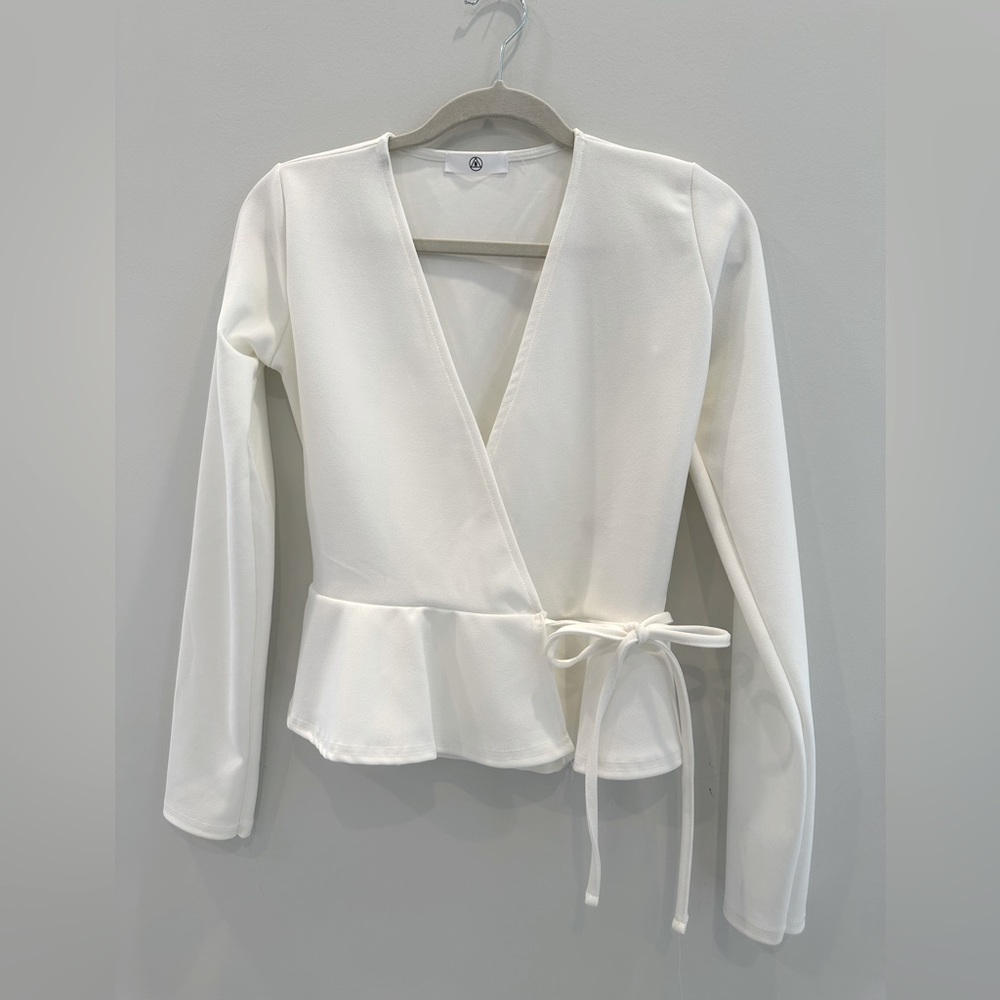 Wrap crossover peplum blouse